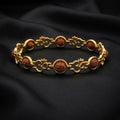 Rupastha Gold-Plated Om Link Rudraksha Bracelet